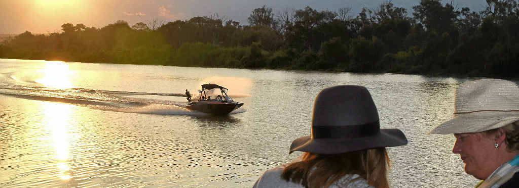 A glass of wine by the Murray River as the sun goes down is the perfect way to unwind. A glass of wine by the Murray River as the sun goes down is the perfect way to unwind.